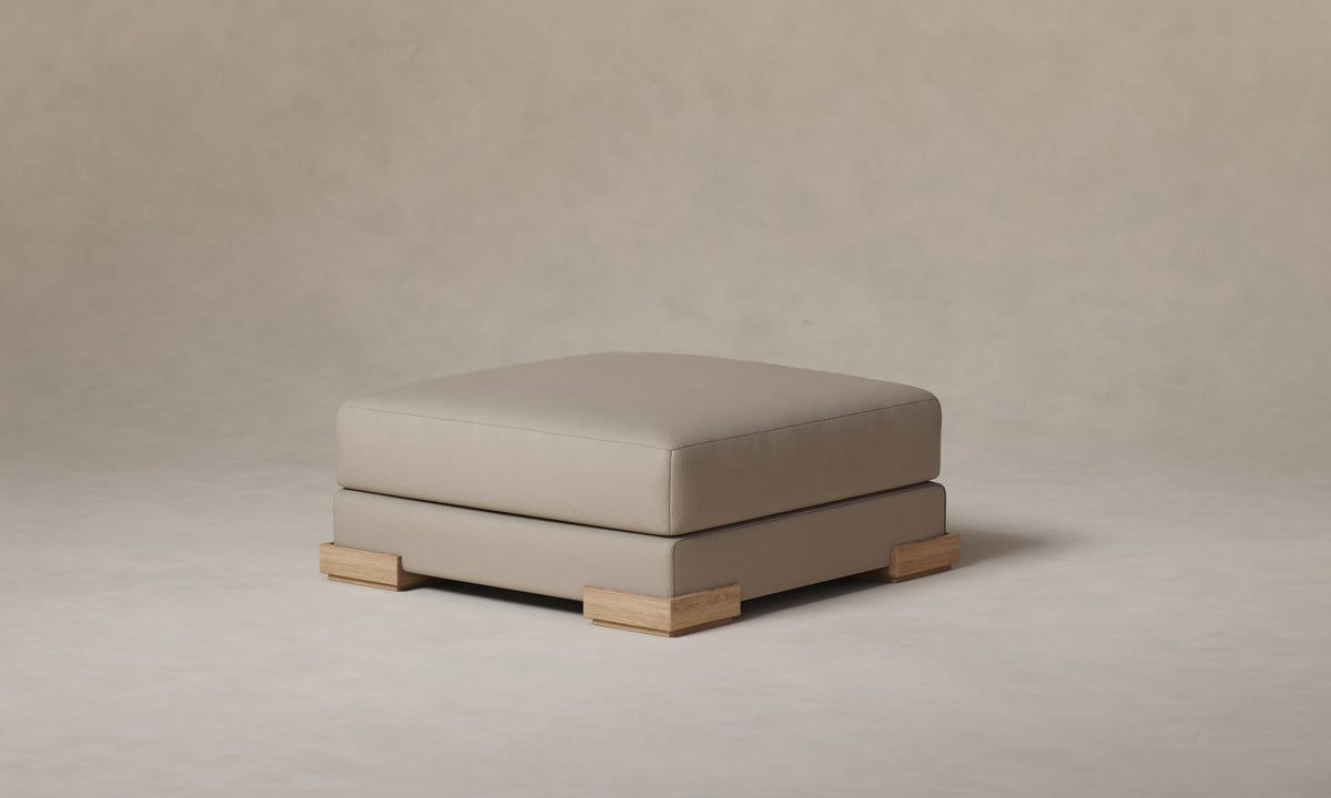The Blair Ottoman - Pebbled Leather Stone