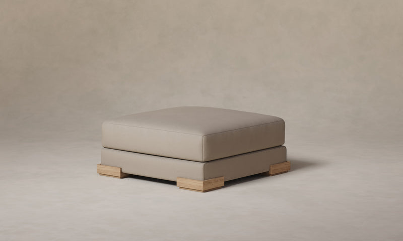 The Blair Ottoman - Pebbled Leather Stone