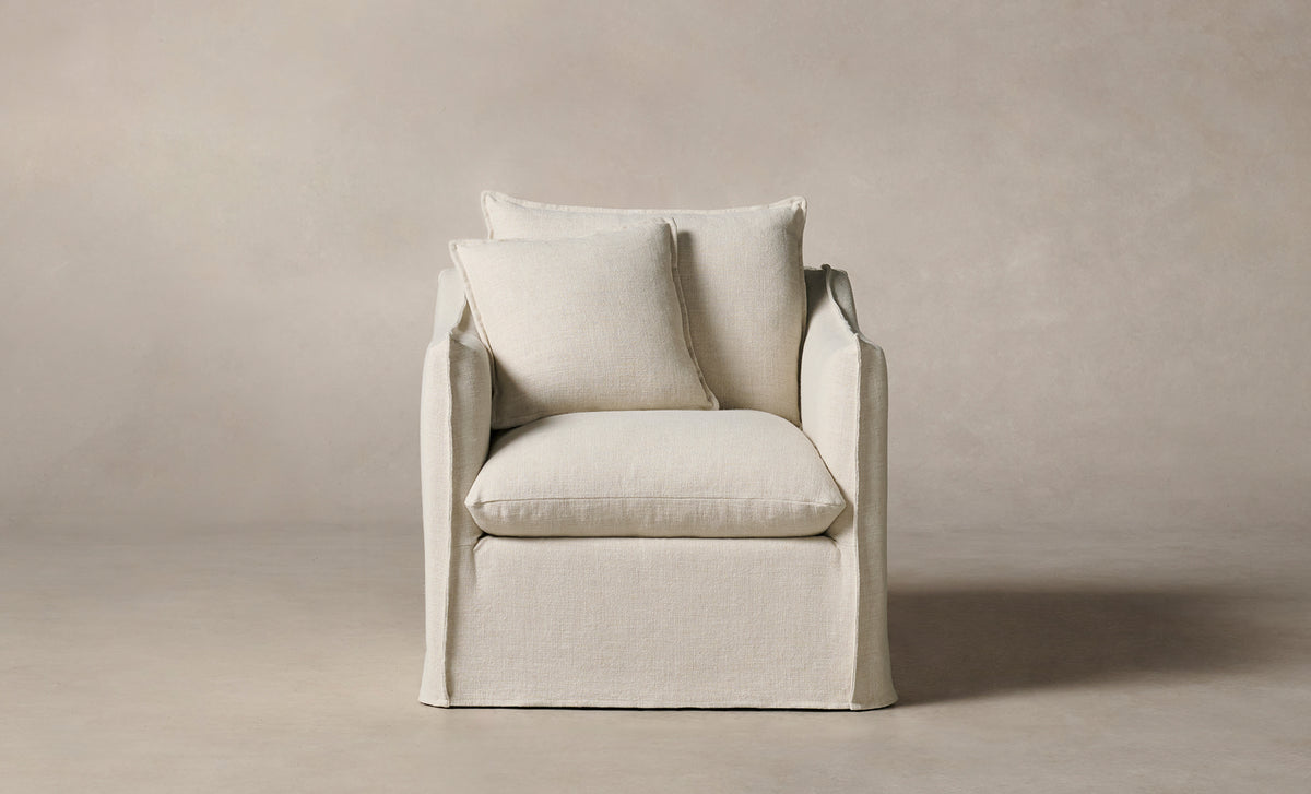 dune white linen upholstered accent chair with cushions