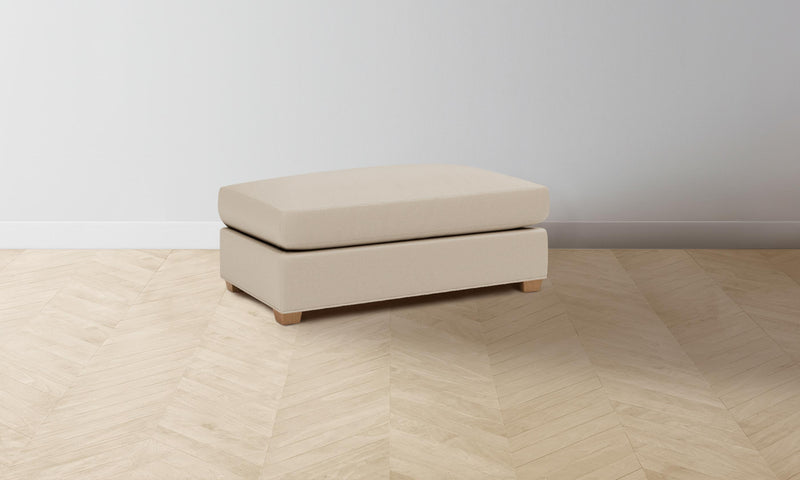 The Sullivan Ottoman - Pebbled Leather Stone