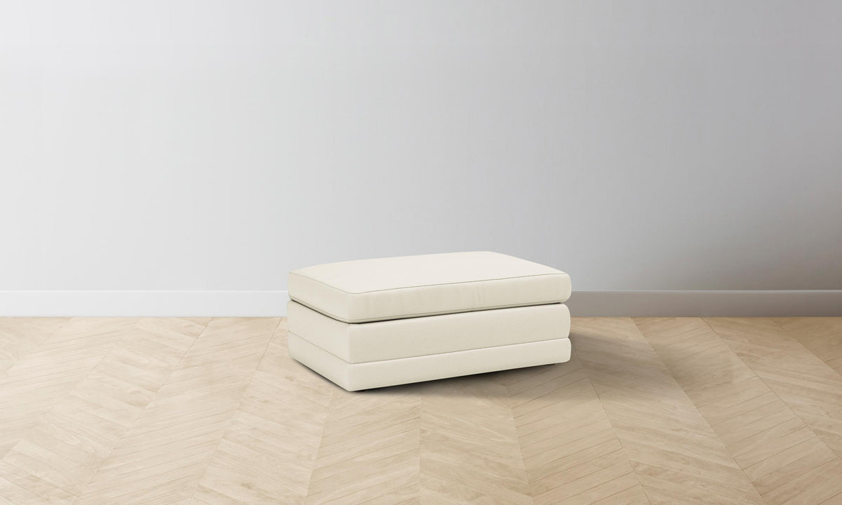 The Warren Ottoman - Pebbled Leather Swan
